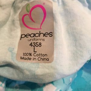 Scrub Top…. Peaches brand floral scrub top size  L